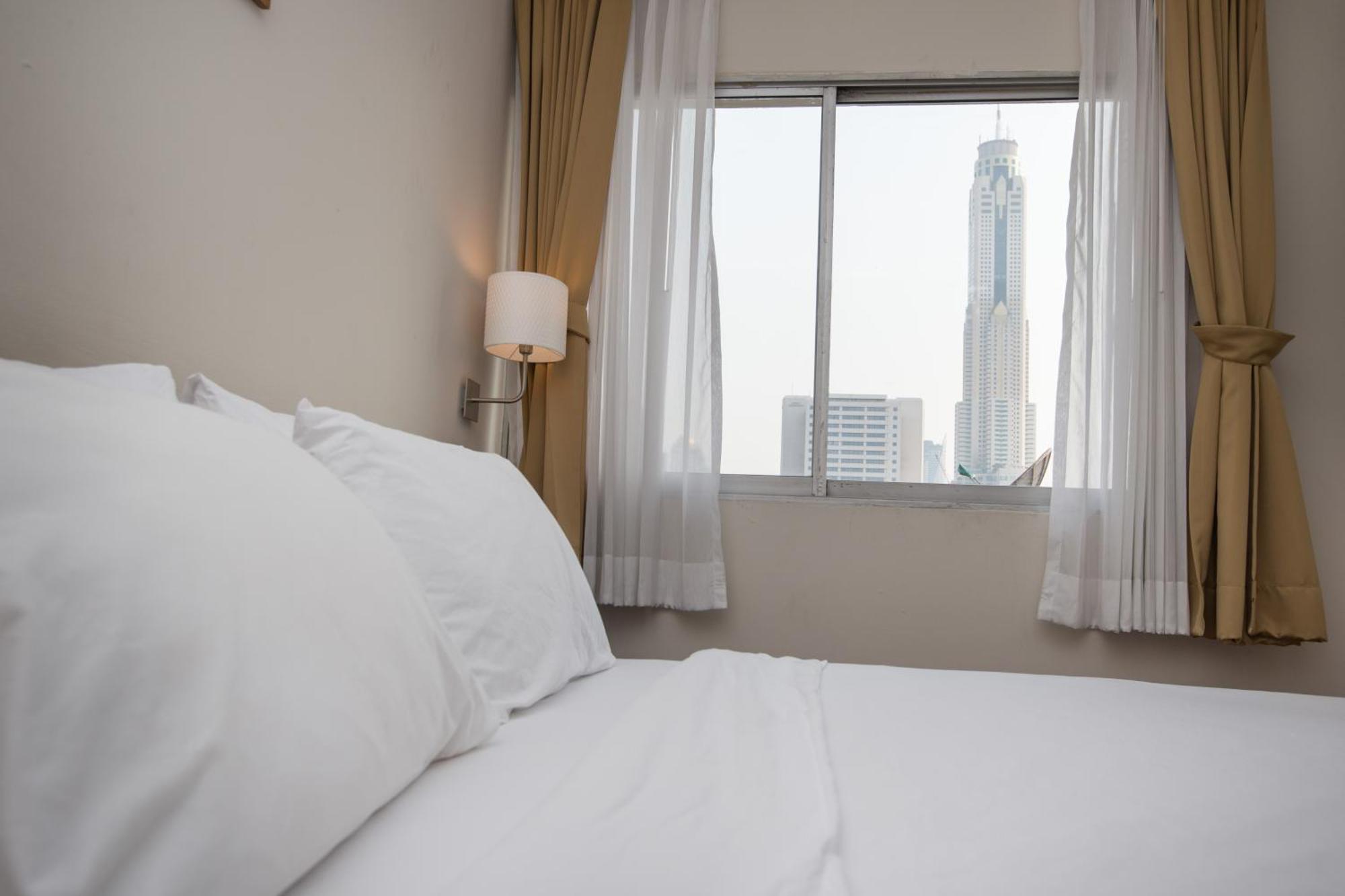 Seasons Siam Hotel Bangkok Oda fotoğraf